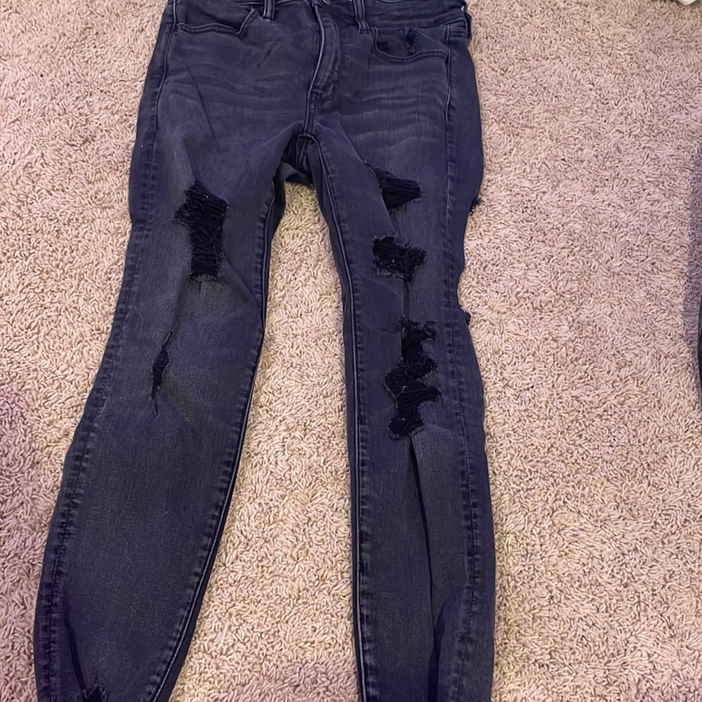 black ripped jeans